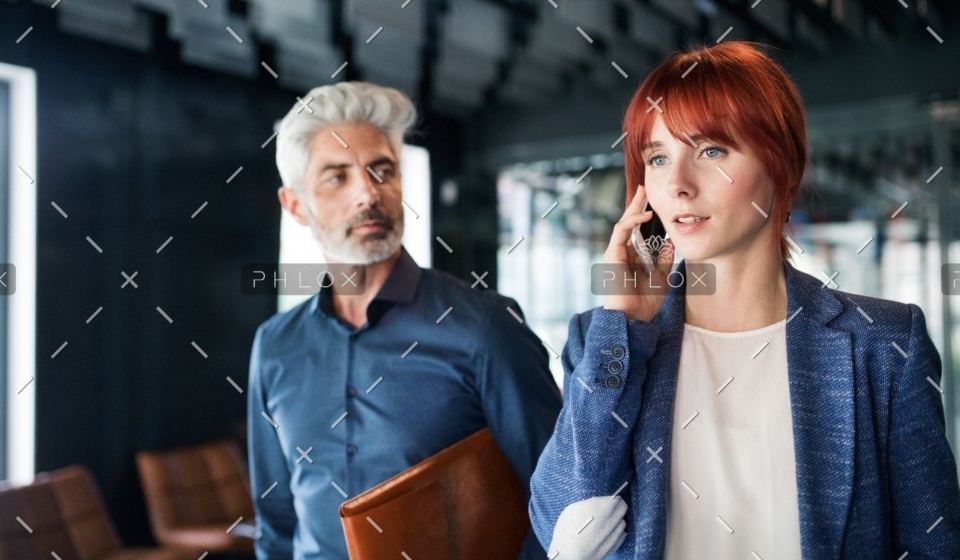 demo-attachment-551-business-people-in-the-office-making-a-phone-call-PQZTHDY